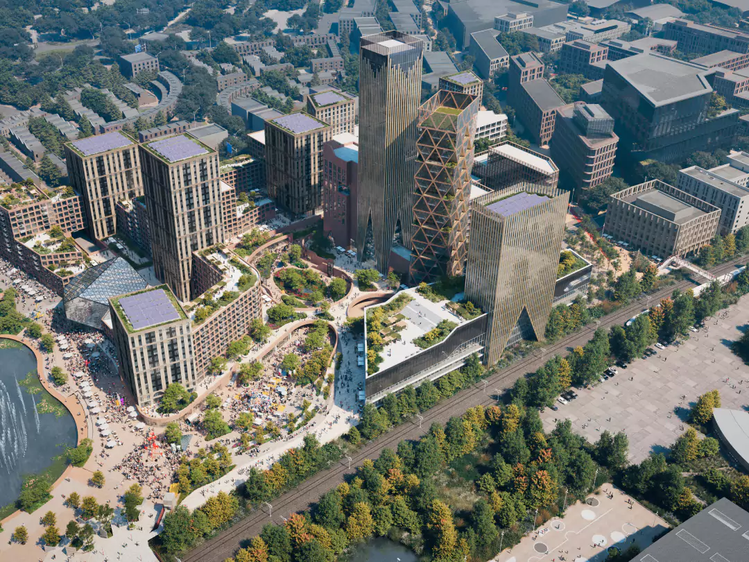 Aerial CGI of City Green - the town centre at Brabazon, showing modern high-rise buildings, green spaces and bustling pedestrian zones. 