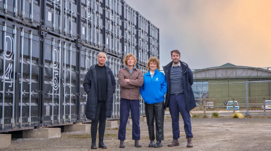 Representatives from Forward & YTL Developments standing outside Boxworks, large shipping container offices at Brabazon.