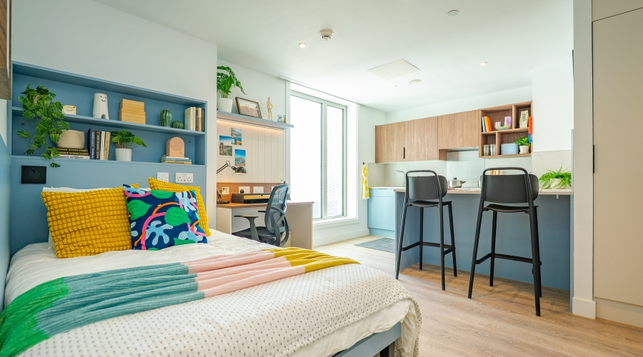 Studio accommodation at The Propeller Quarter in Brabazon, featuring a bedroom area, study space, kitchen and dining area within an open-plan layout.