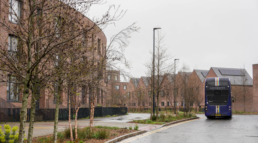 Rear of the First m4 Metrobus driving through Brabazon on a wet day.
