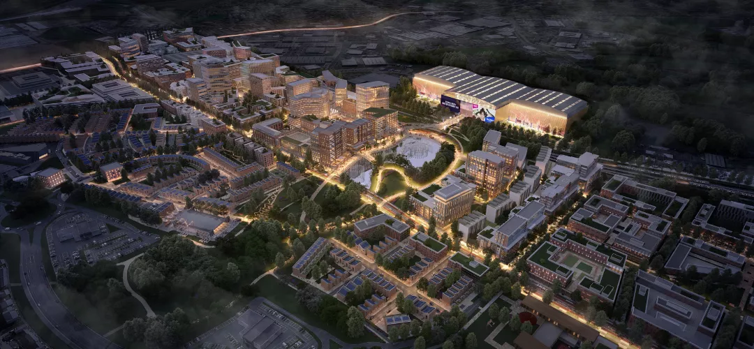 Aerial CGI of Brabazon lit at night and when fully built, showing the Aviva Arena at the centre.