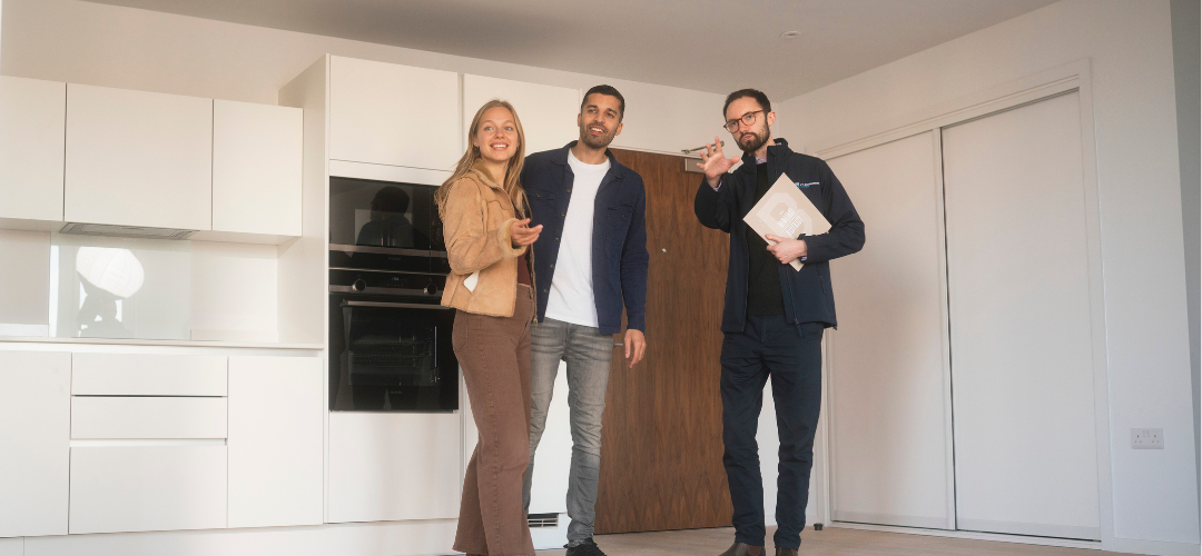 Couple touring the Show Homes at Brabazon with a New Homes Consultant from YTL Developments.