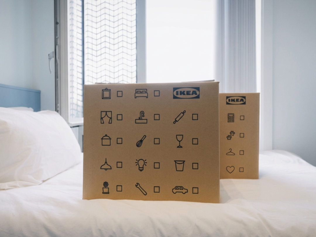 IKEA essentials box on a bed at The Propeller Quarter student accommodation, highlighting the partnership helping students prepare for move-in at Brabazon.