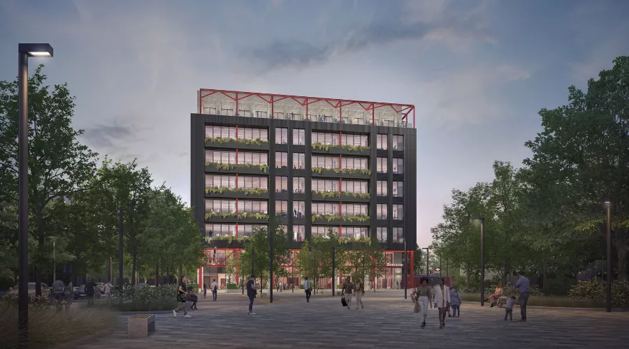 CGI of eight-storey office development from the station square at Brabazon, Bristol at dusk. 