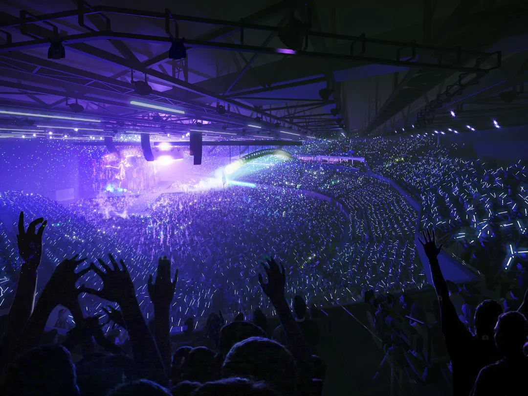 Energetic concert atmosphere inside Aviva Arena Bristol amid vibrant stage lights.