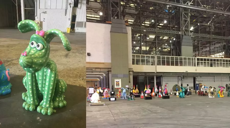 Collection of Wallace & Gromit sculptures being stored in a historic hangar at Brabazon, which a highlight on 'Pickles McPrickles' Gromit sculpture.