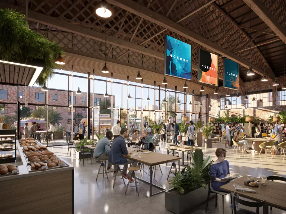 Customers eating, drinking and relaxing at the new Mokoko Bakery location within Spitfire Hangar at Brabazon.